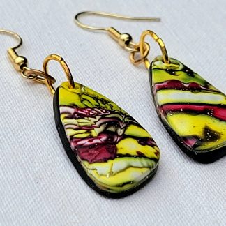 Boucles d'oreilles entre citron et grenade